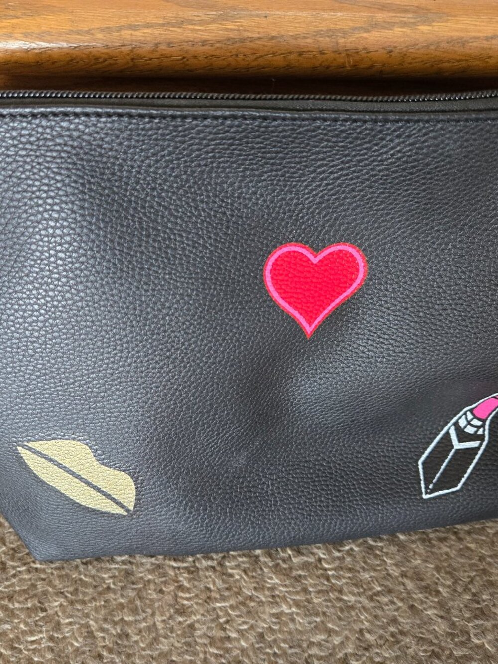 NWOT never used hearts, lipsticks bag have paper inside bag